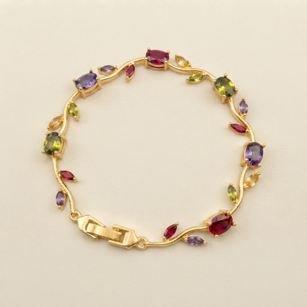 Gold vine-style tulip leaf bracelet with oval and marquise crystals in green, red, and purple on light beige background - Snap Mart Pakistan