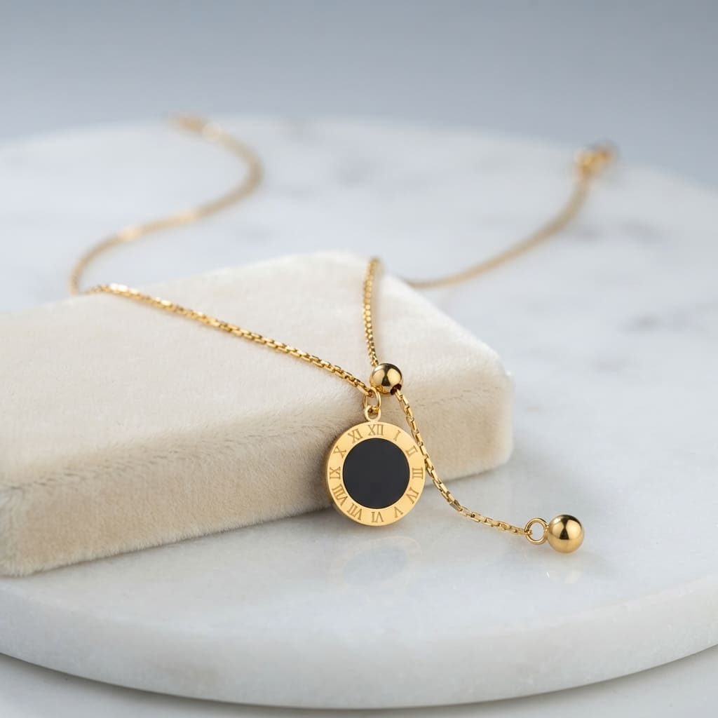Double-sided gold Roman numeral pendant necklace with white stone center on display bust - Snap Mart Jewelry Pakistan