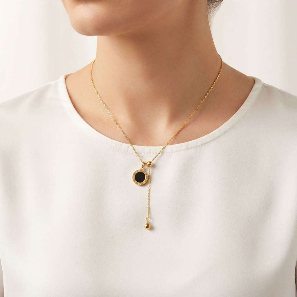 Double-sided gold Roman numeral pendant necklace with black center worn by model - Snap Mart Jewelry Pakistan