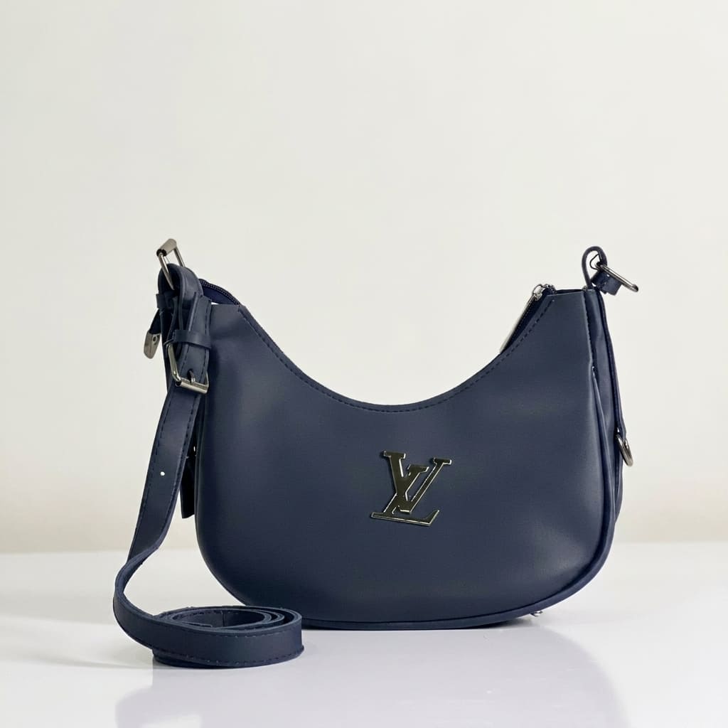 Navy blue leather curved shoulder bag front view on white background with silver metal logo